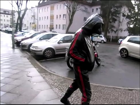 Rubber gimp on the public street in berlin