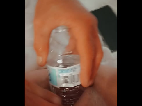 Water bottle in stretched pussy