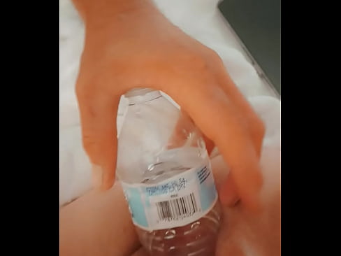 Water bottle in stretched pussy