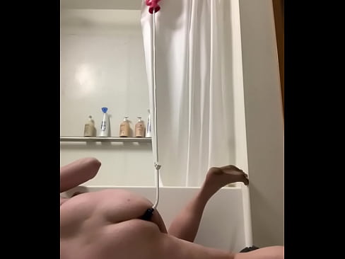 Slutty trans girl gives herself an enema before getting rawed