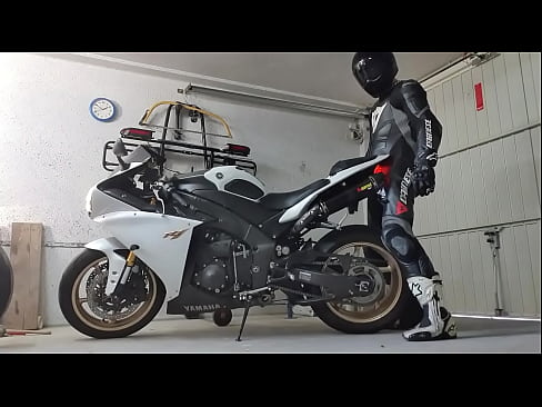 White leathered biker wanking with a Yamaha R1 motorbike