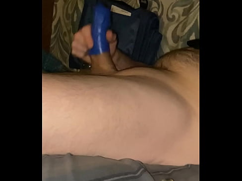 Stroking his huge cock with his toy so I can watch