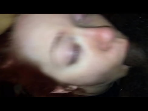 Redhead made to take black cock in her mouth