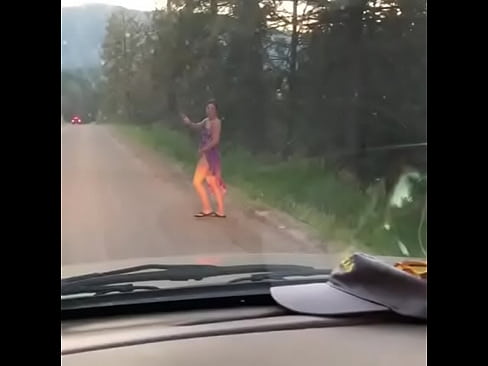 Hitchhiker in the woods, gets banged over a tree for a ride back into town.