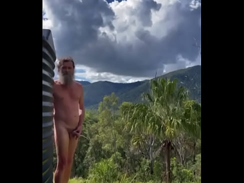 Peepee piss outdoors while naked man admires conservation reserve and nudist campground