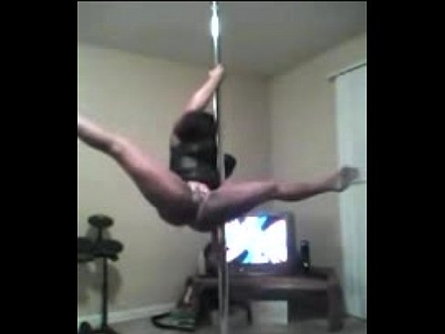 Hot black babe teasing and dancing pole