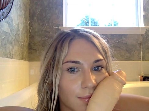 Blonde Shemale in tub with dildo