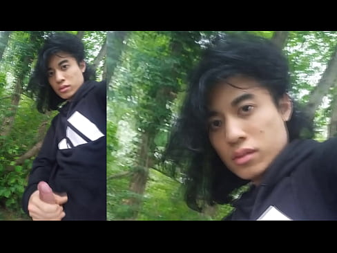 Asian gay twink masturbates, precum comes out of his erect penis, sexy guy ejaculates cum outdoors in rainy weather and birdsong by the river Jon Arteen shoots a gay porn video for fans who love handsome twink Asian boys The young guy masturbates penis