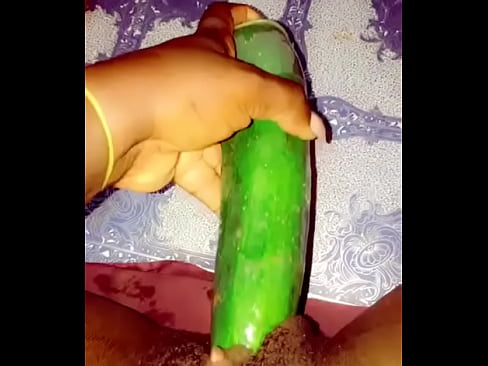 Ebony young princess loves her  cucumber
