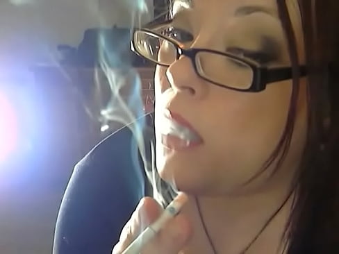 Chubby Mistress Dangles Her Cigarettes As She Smokes