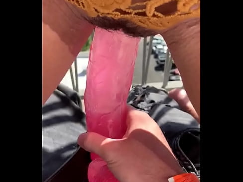 Slut fucking huge dildo in public