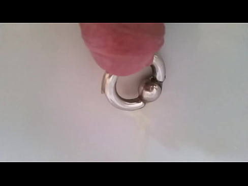 Pissing through a piercing