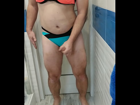 Tranny wearing bikini and jerking