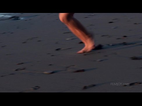 Naked on the beach