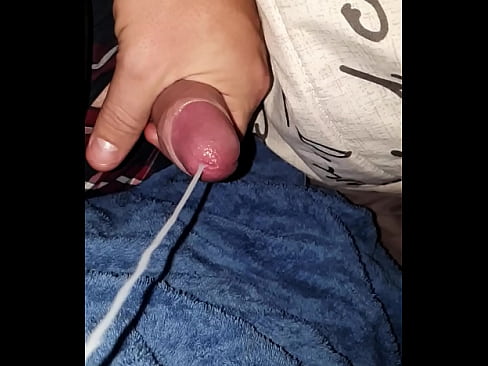 Jerking cum shot while watching porn