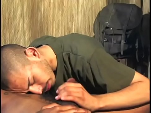 Gay black guy lies back and enjoys his partner blowing his cock