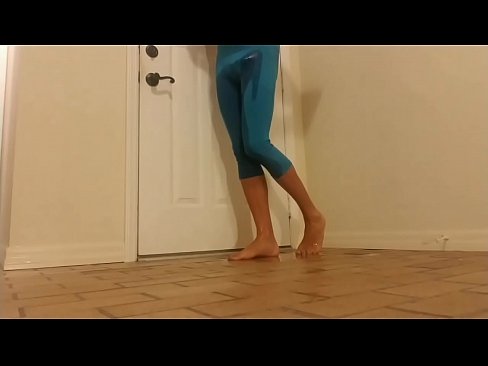 Shemale urinating in yoga pants
