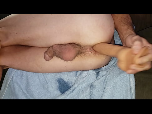 Solo anal dildo action from behind