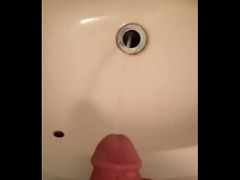 Pissing in the sink. (First video)