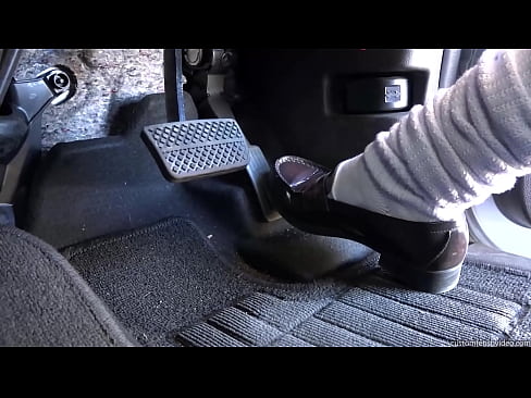 Girl blasting the gas pedal of a car