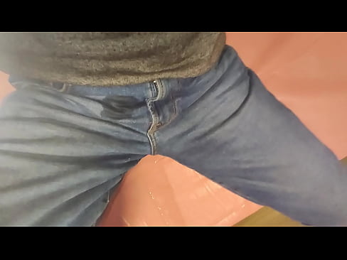 Pissing in Jeans on the table