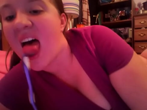 amateur girl puts toothbrush in ass