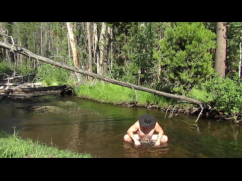 Naked wash in the river