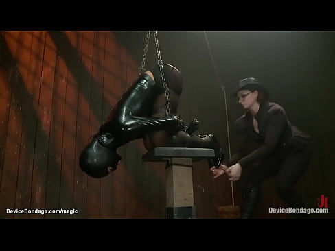 Bent over metal gagged lesbian slave Cassandra Nix ass caned and pussy hooked then in latex shirt and gimp mask fucked with dildo in suspension by lezdom Claire Adams