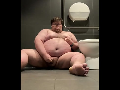 Chub cums in public toilet