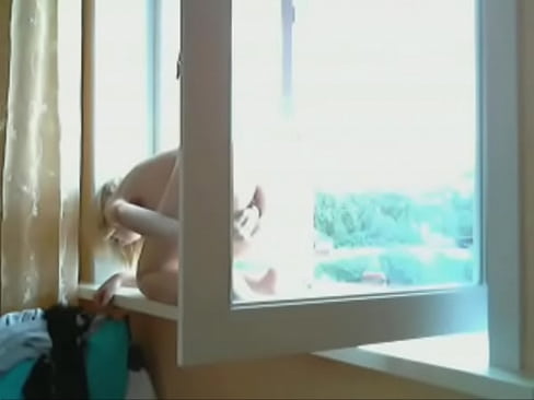 My beloved masturbates in the window for neighbours