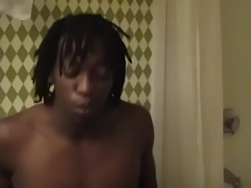 Sexy black twink gives his dick in shower room