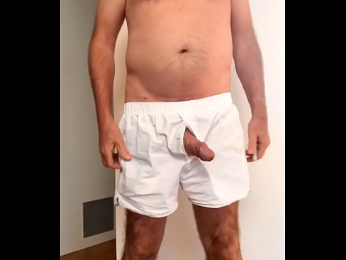 Semi hard cock and bush in white boxers