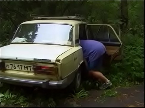 Russian couple is fucked by car in the woods