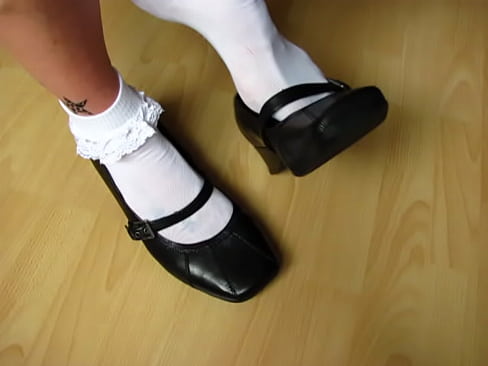 French College Girl shows her teasing frilly socks and black leather pumps