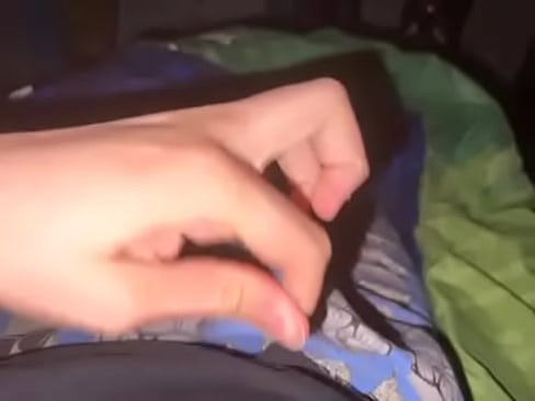 Teen boy plays with himself in bed