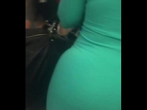 Brunette big ass in green dress