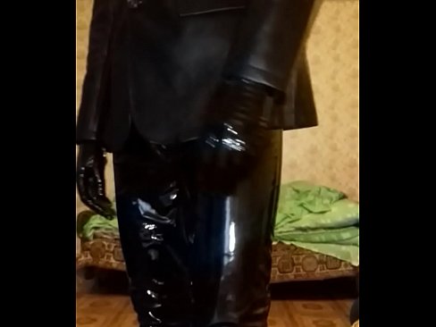 Guy dressed in leather jacket, pvc pants