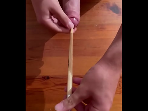 Cum sounding with wooden brush