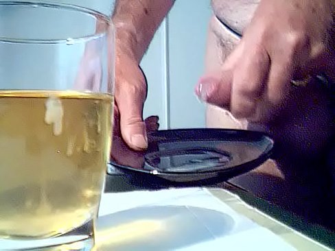 Me masturbating and ejaculating in a glas of piss