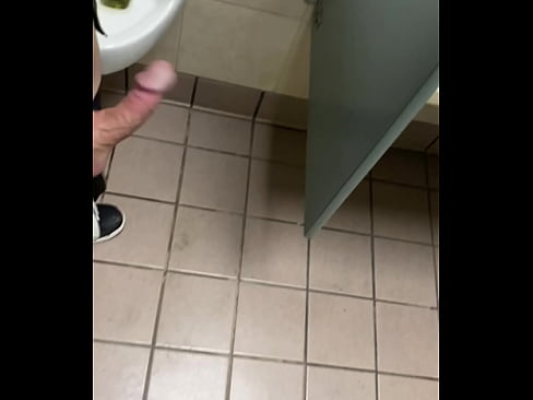 Jerking in a public bathroom!