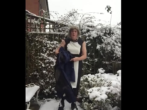 Outside in the snow - Johanna poses in dress.