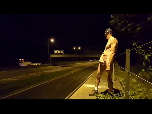 Pissing at nightime next to Public motorway