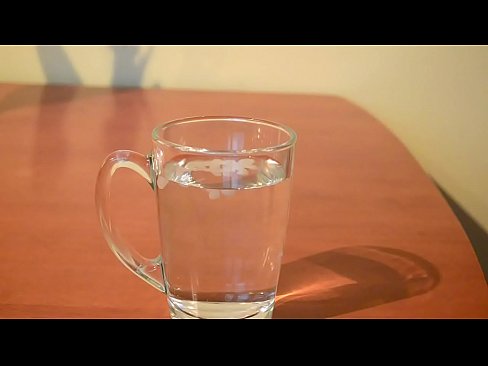 Cumming into glass of water