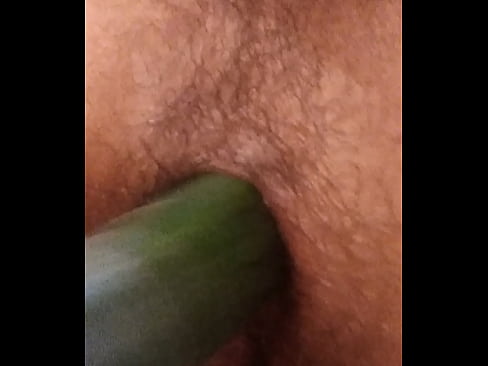 Cucumber on transgender pussy
