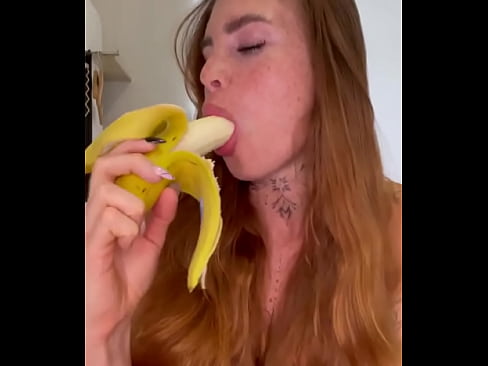 Ginger Teen Sucks On Banana