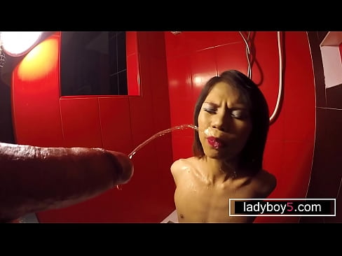 Thai teen shemale in bondage pissed in her mouth and sucking dick