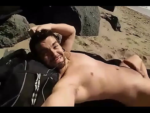 Ian Delvalle sunbathing at a gay nude beach in San Francisco.