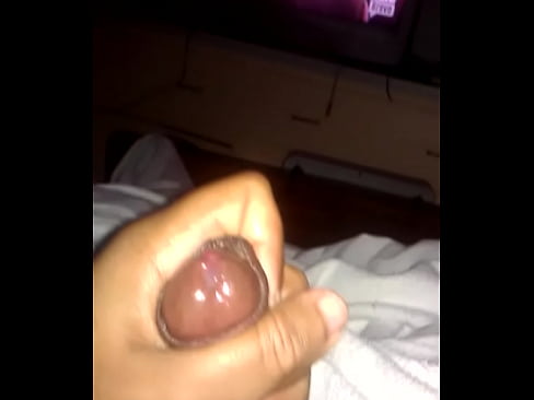 Masturbating