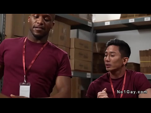 Asian worker Jkab Ethan Dale gets throat fucked by his black colleague Andre Donovan then anal fucked with his big black cock in stockroom