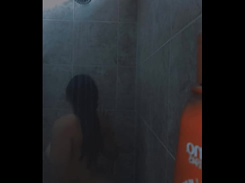 Tiny teen riding huge toy in the shower